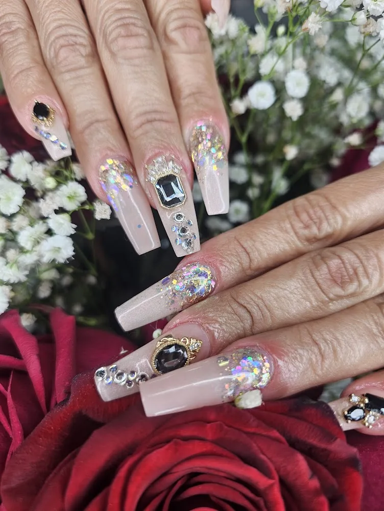 Nude coffin acrylic nails with crystals and a French tip, sculpted at May Art in Tamarac